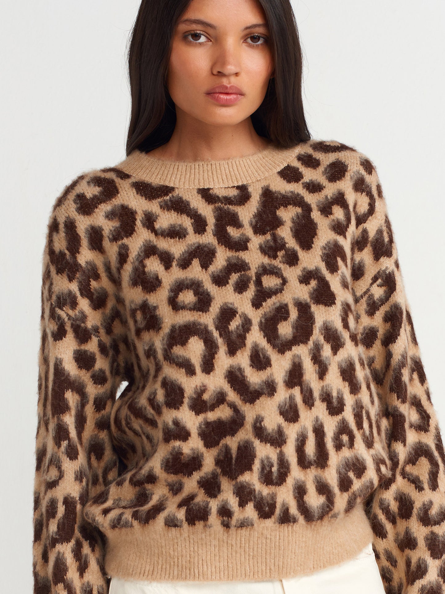 Leopardo rašto megztukas
