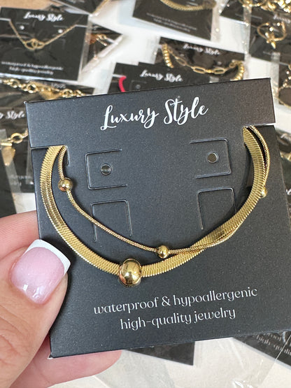 Elegantiška plieninė apyrankė su 18K aukso danga