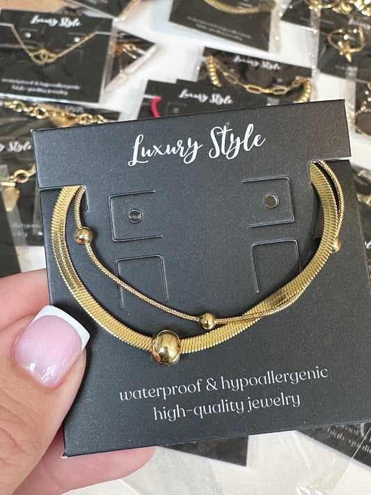 Elegantiška plieninė apyrankė su 18K aukso danga